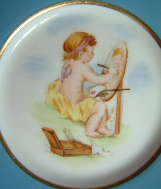Royal Worcester cherubs cup and saucer